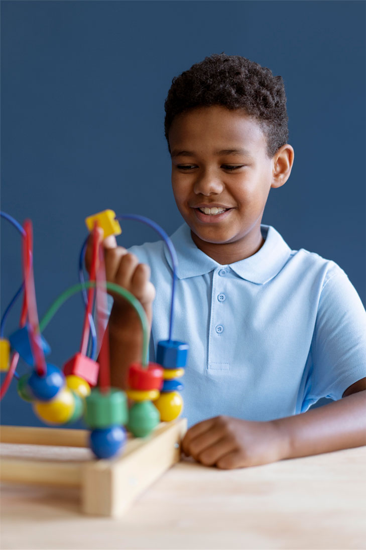 little boy having occupational therapy session